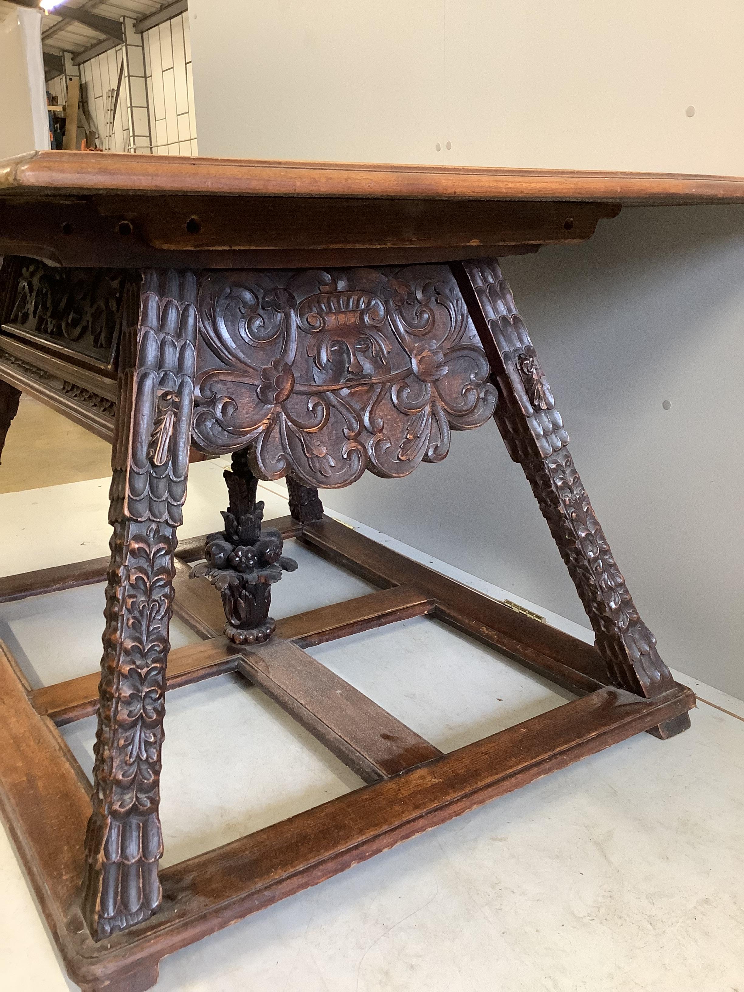 An Italian marquetry inlaid rectangular walnut slate top centre table, width 123cm, depth 104cm, height 79cm